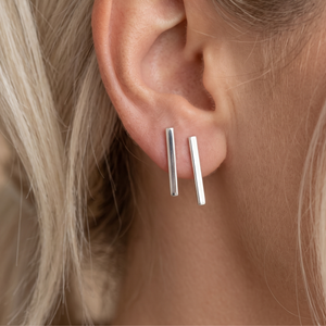 
                  
                    Sterling silver long bar stud earrings — 20mm flat-edge rectangle studs
                  
                
