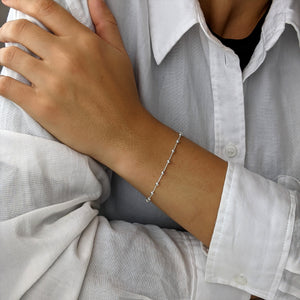 
                  
                    Sterling Silver Cross Rolo Chain Bracelet
                  
                