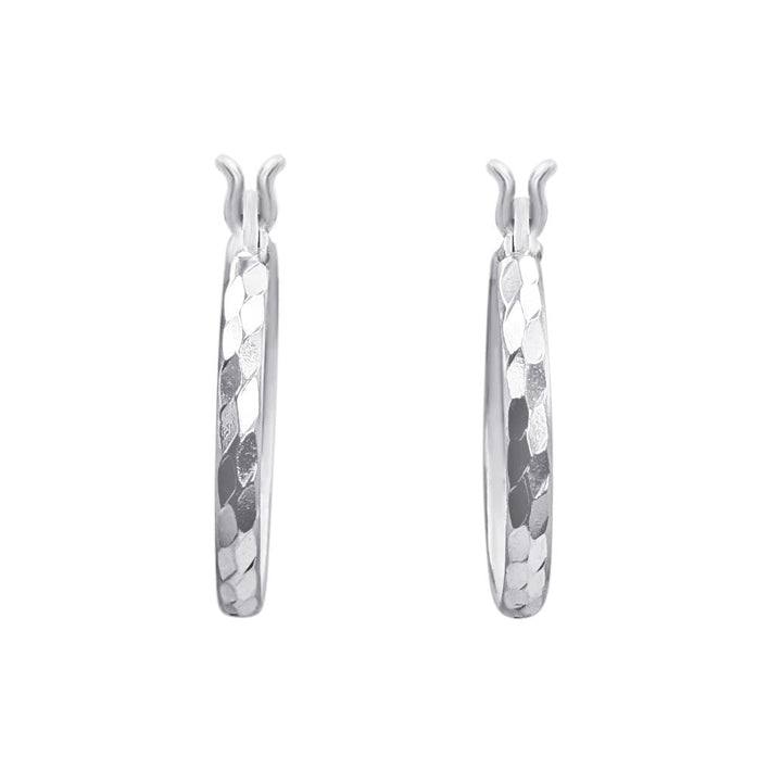 Pair of sterling silver hoop earrings with a sparkly diamond-cut finish