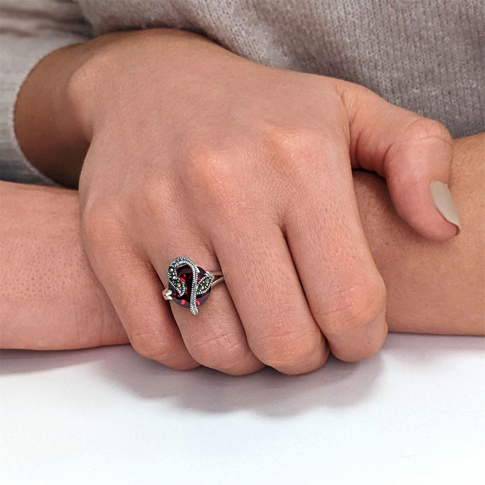 
                  
                    Sterling Silver Marcasite Red Round Cut CZ Flower Ring
                  
                