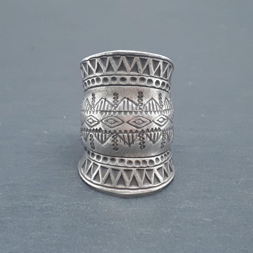 
                  
                    Hill Tribe Silver Wide Half Finger Tribal Motif Adjustable Ring
                  
                