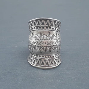 
                  
                    Hill Tribe Silver Wide Half Finger Tribal Motif Adjustable Ring
                  
                