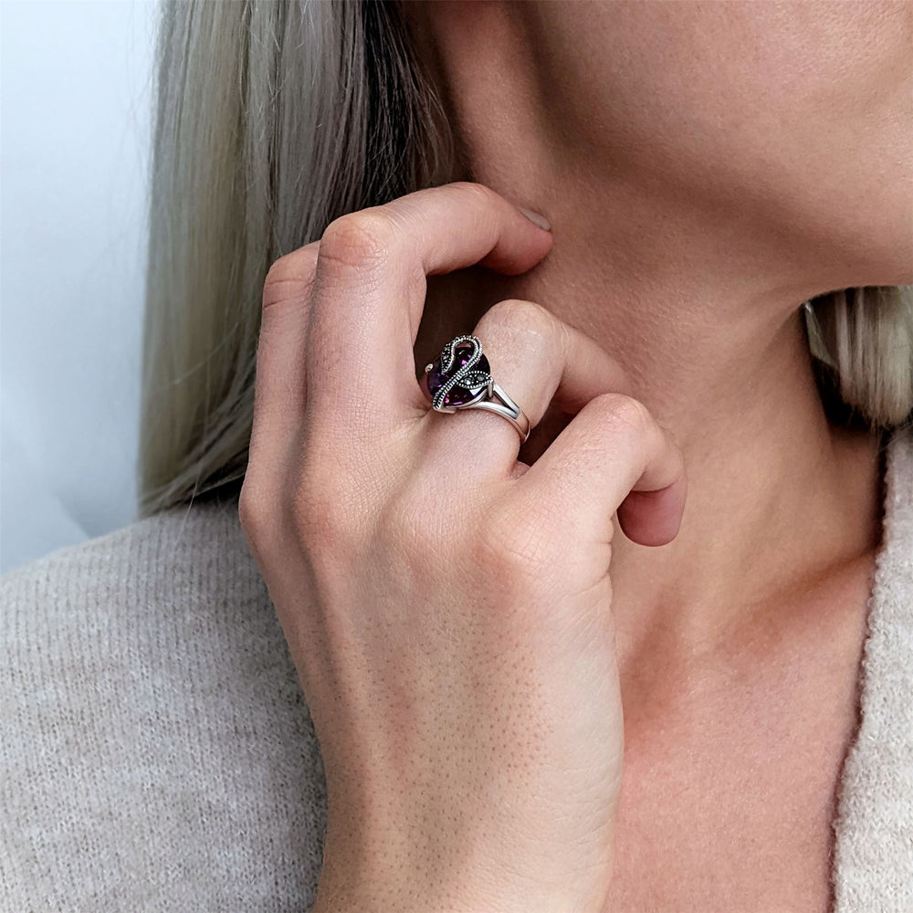 
                  
                    Sterling Silver Marcasite Purple Round CZ Flower Ring
                  
                