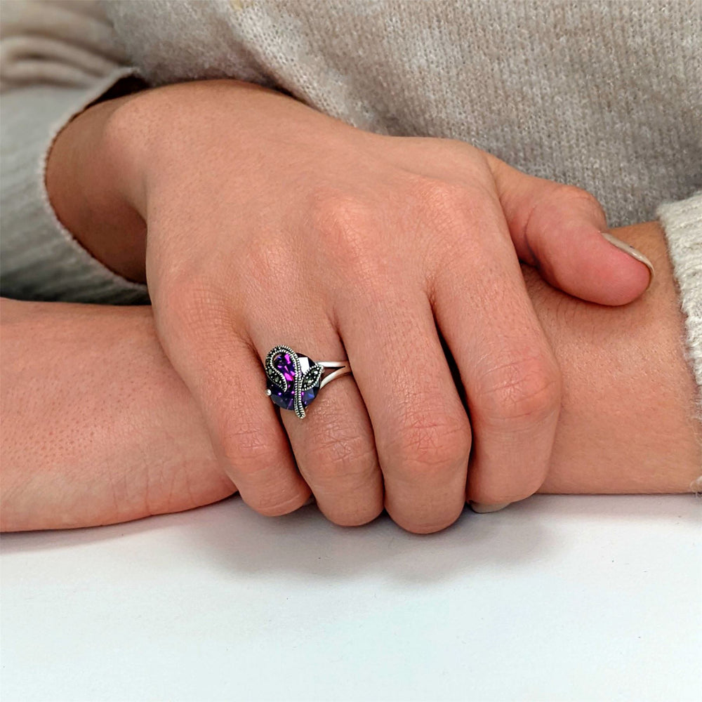 
                  
                    Sterling Silver Marcasite Purple Round CZ Flower Ring
                  
                