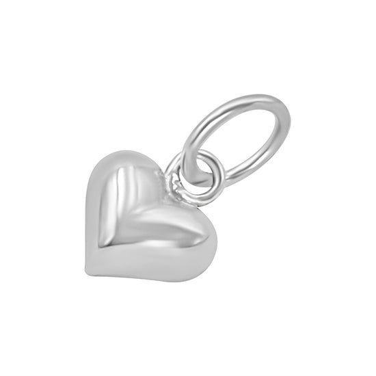 A sterling silver puffed heart charm with a jump ring at the top, shown on a plain white background.
