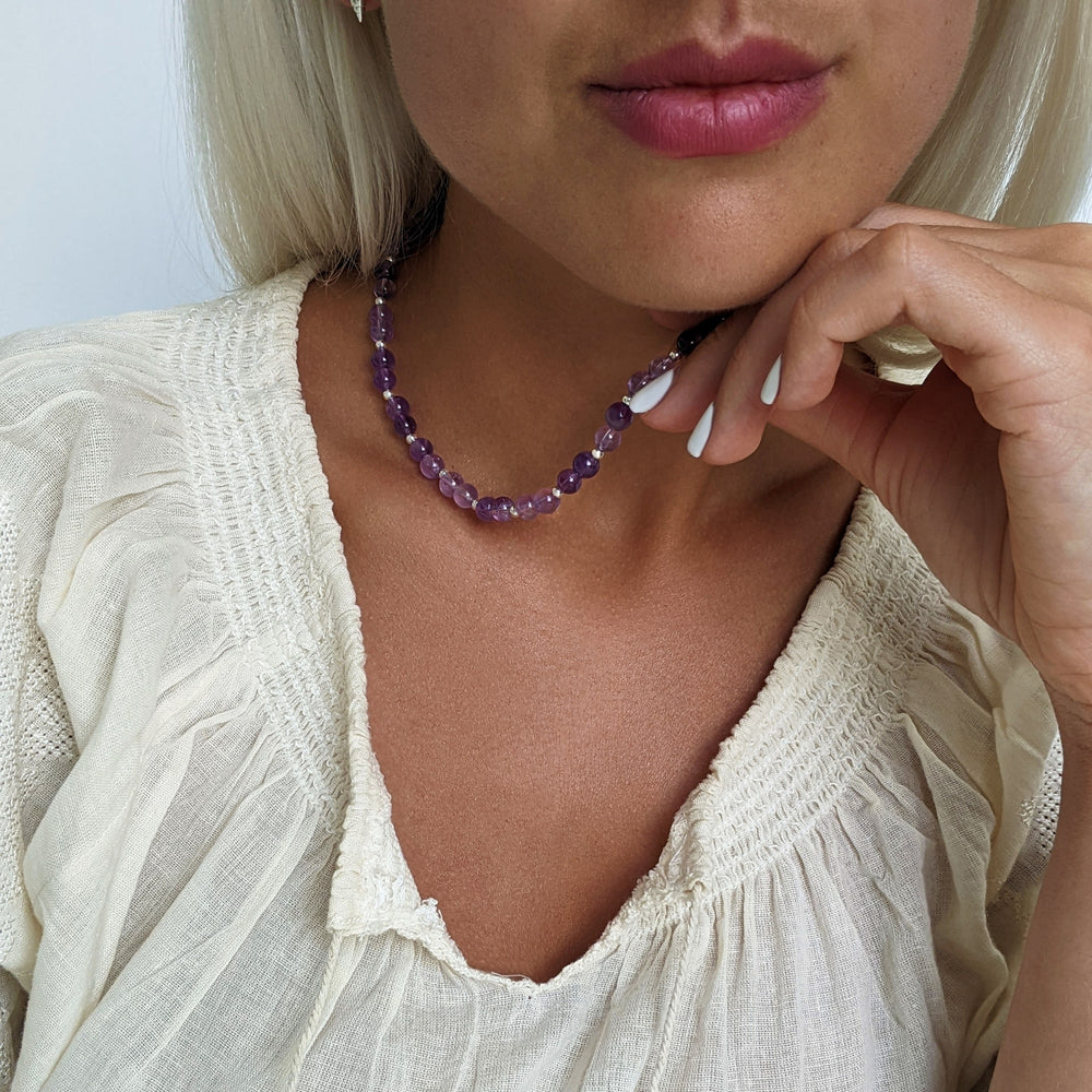 
                  
                    Sterling Silver Round Amethyst Beaded Purple Gemstone Strand Necklace
                  
                