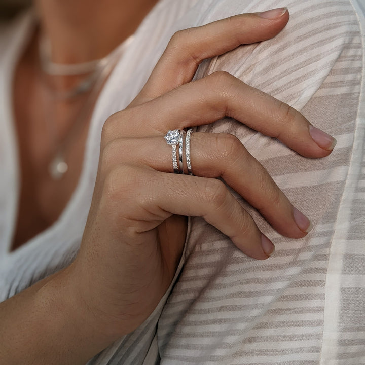 Sterling silver cubic zirconia double band ring styled with a solitaire engagement ring — minimalist stack