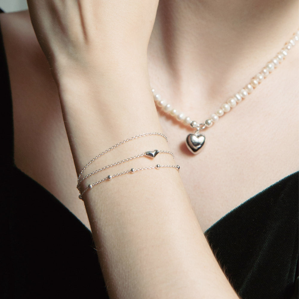 
                  
                    Sterling Silver Freshwater Pearl Beaded Necklace With Puffed Heart Pendant
                  
                