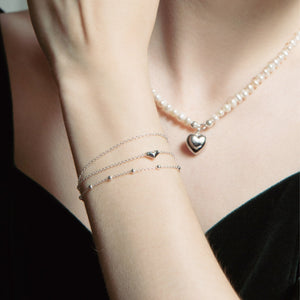 
                  
                    Sterling Silver Freshwater Pearl Beaded Necklace With Puffed Heart Pendant
                  
                