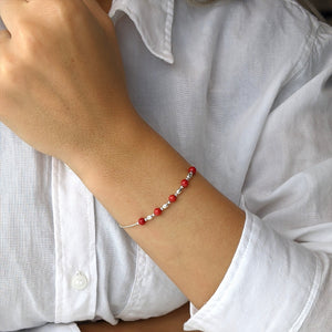 
                  
                    Sterling Silver Red Bead Bracelet
                  
                