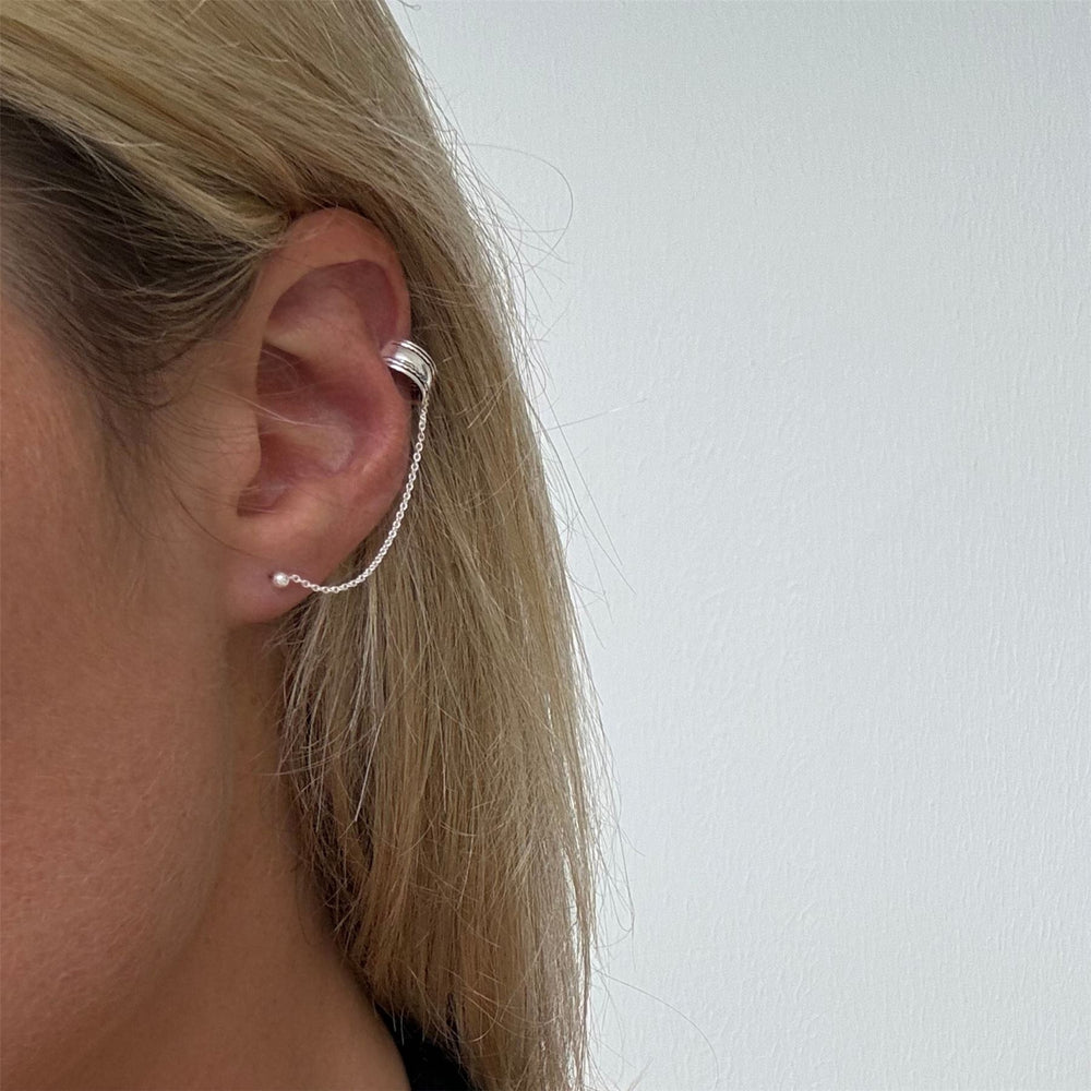 
                  
                    Sterling Silver Barrel Ear Cuff With Chain Connected Stud Earring
                  
                