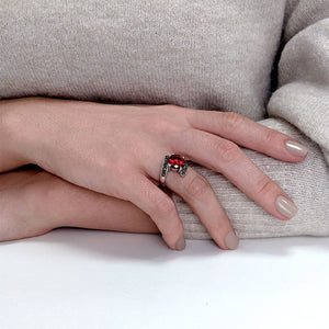 
                  
                    Sterling Silver Black Marcasite Red CZ Round Cut Bypass Ring
                  
                