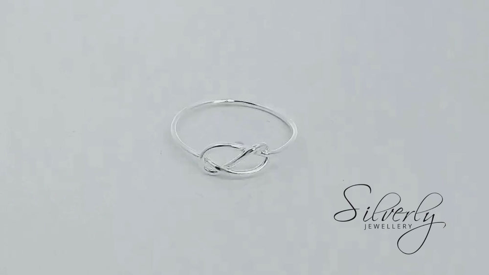 
                  
                    Load and play video in Gallery viewer, Sterling Silver Love Infinity Knot Thin Wire Ring Stackable Band
                  
                
