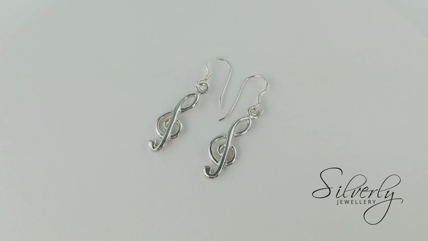 
                  
                    Load and play video in Gallery viewer, Sterling Silver Musical Note Treble Clef Dangle Earrings With Hooks
                  
                