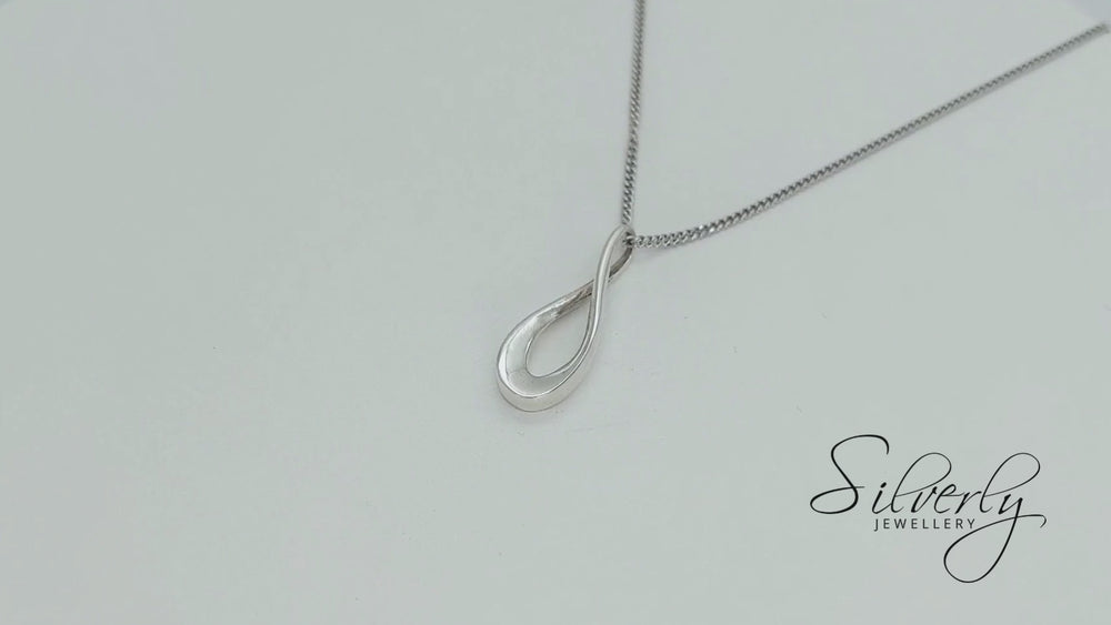 
                  
                    Load and play video in Gallery viewer, Sterling Silver Infinity Symbol Charm Twist Teardrop Pendant Necklace
                  
                