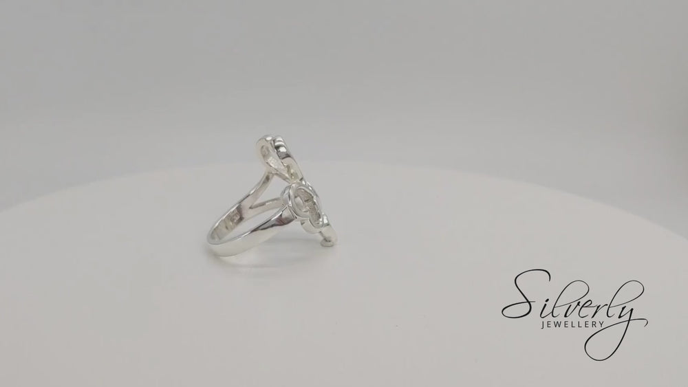 
                  
                    Load and play video in Gallery viewer, Sterling Silver Four Cut-Out Heart Wide Wrap Adjustable Open Ring
                  
                