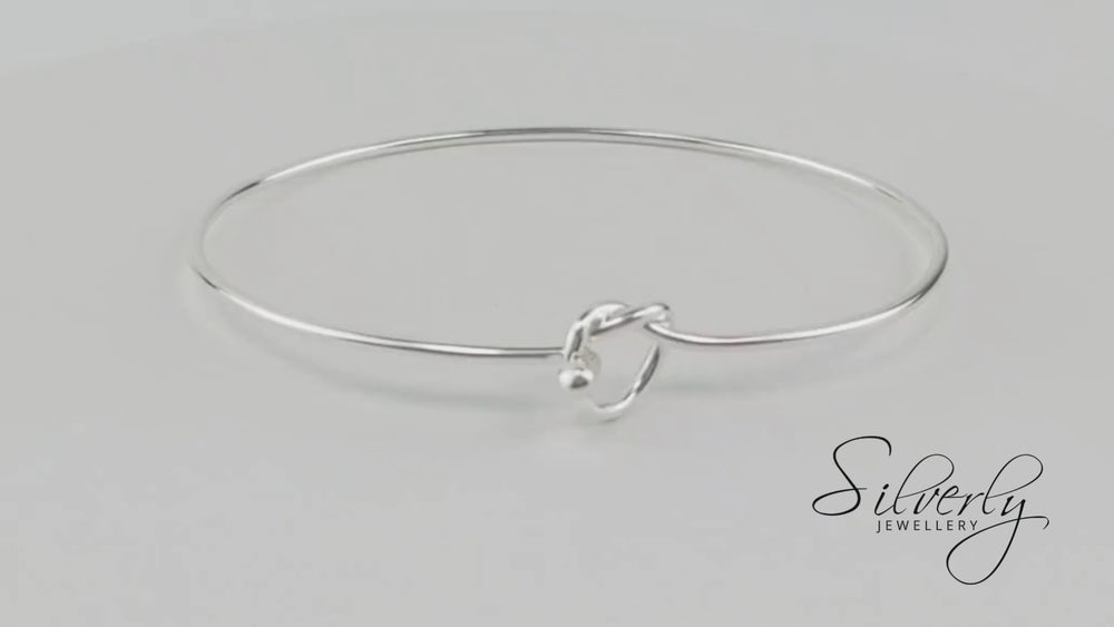 
                  
                    Load and play video in Gallery viewer, Sterling Silver Friendship Bracelet Knot Bangle With Hook Clasp
                  
                