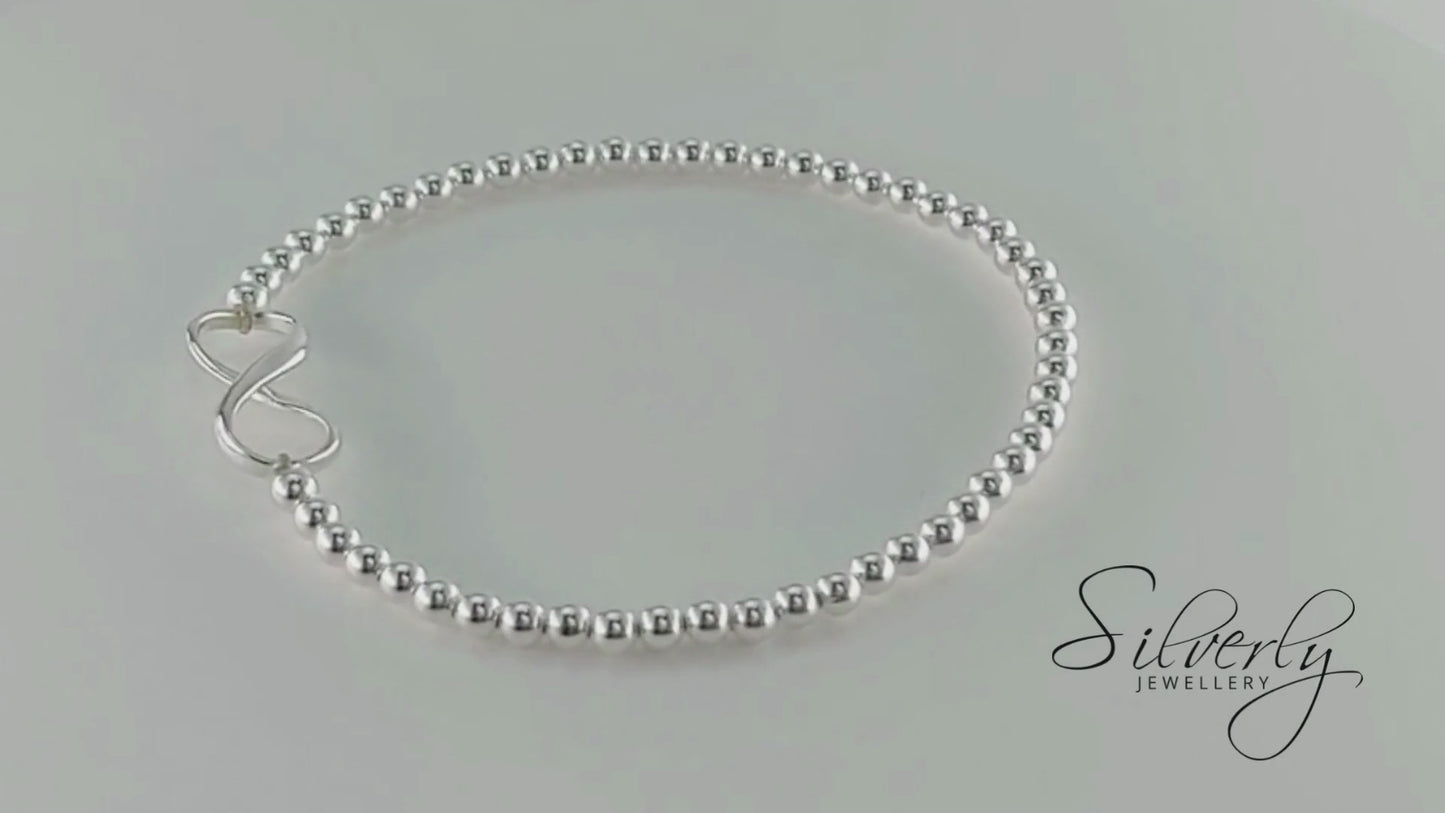 Sterling Silver Infinity Stretch Bracelet - Simple Ball Bead Design
