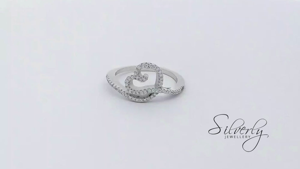 
                  
                    Load and play video in Gallery viewer, Sterling Silver Cubic Zirconia Heart Knot Swirl Twist Ring Sparkly Band
                  
                