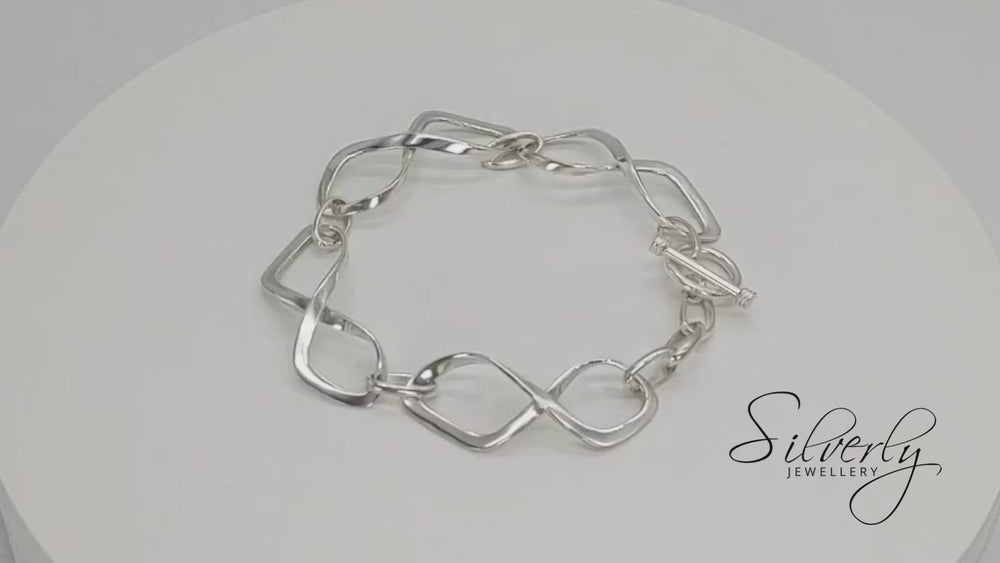
                  
                    Load and play video in Gallery viewer, Sterling Silver Statement Twisted Infinity Symbol Chain Link Bracelet
                  
                