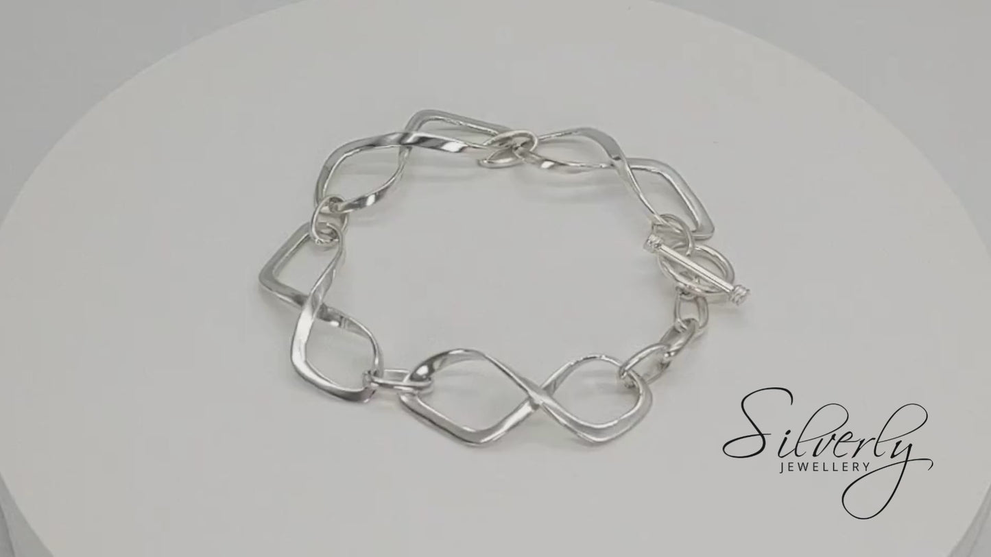 
                  
                    Load and play video in Gallery viewer, Sterling Silver Statement Twisted Infinity Symbol Chain Link Bracelet
                  
                