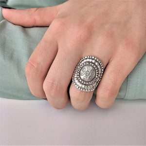 
                  
                    Hill Tribe Silver Wide Disc Engraved Flower Motif Adjustable Shield Ring
                  
                