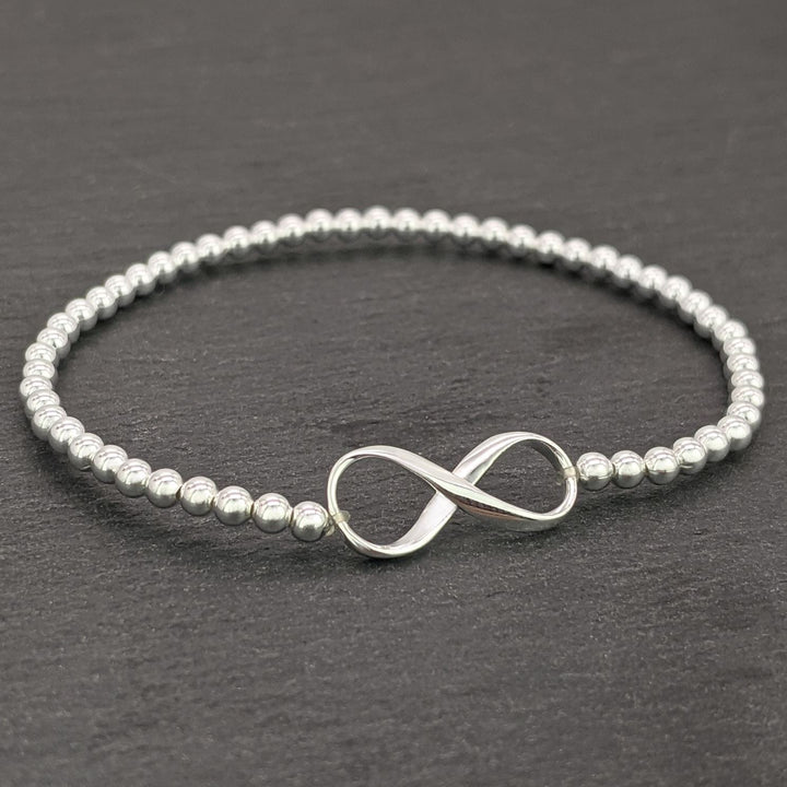 Sterling silver infinity charm bracelet