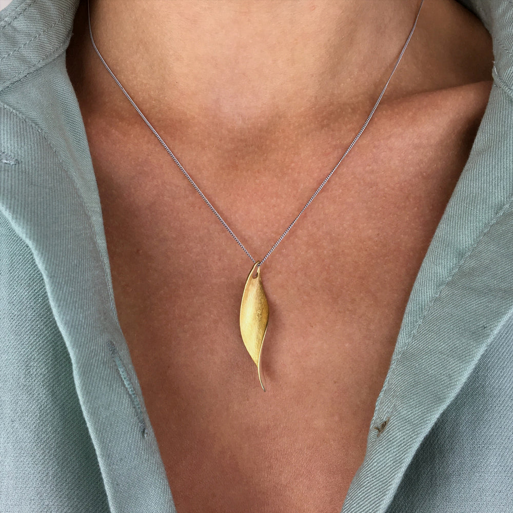 
                  
                    Brushed Gold Plated Sterling Silver Curved Leaf Pendant Necklace
                  
                