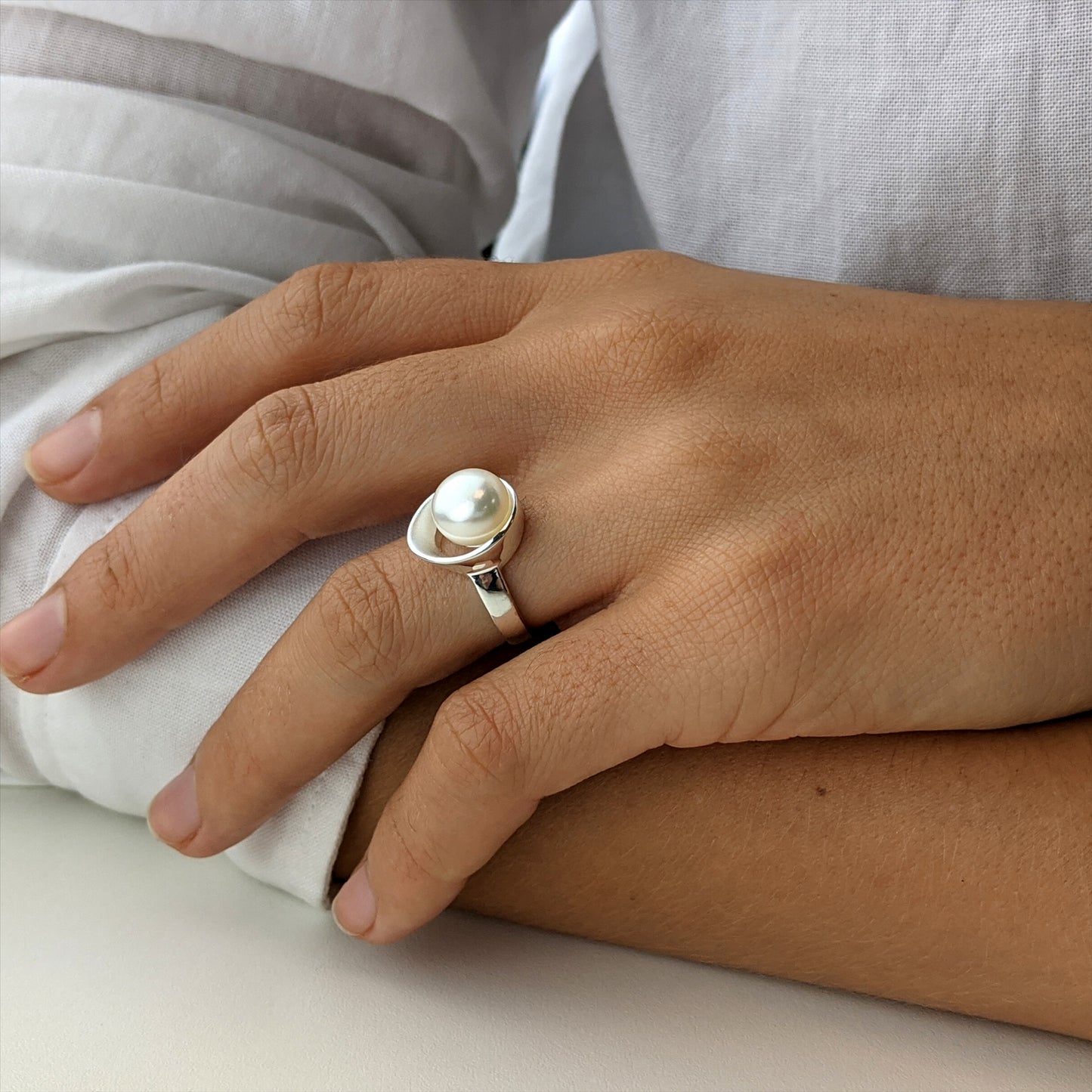 
                  
                    Sterling Silver Cream Freshwater Pearl Modern Oyster Shaped Band Ring
                  
                