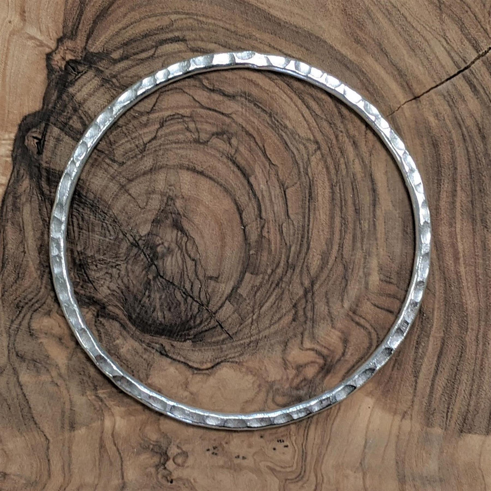 
                  
                    Karen Hill Tribe Silver Simple Hammered Flat Stackable Bangle
                  
                