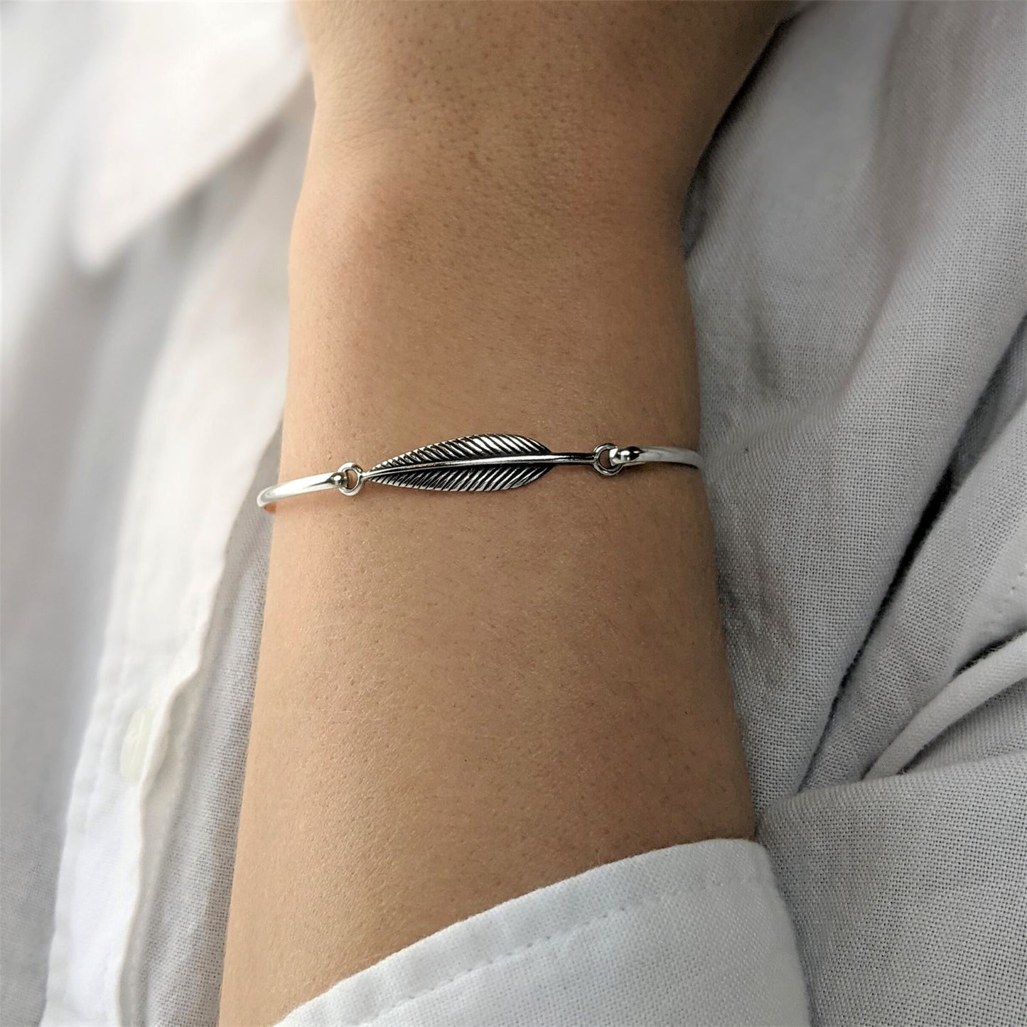 
                  
                    Sterling Silver Thin Elegant Feather Leaf Bangle With Hook Clasp
                  
                