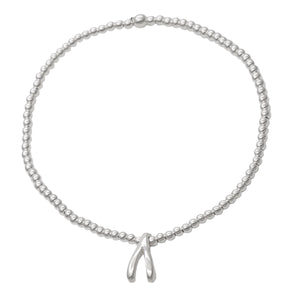 
                  
                    Sterling Silver Wishbone Lucky Charm Stretch Ball Beaded Bracelet
                  
                