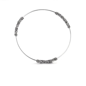 
                  
                    Sterling Silver Thin Round Tube Intricate Balinese Stackable Bangle
                  
                