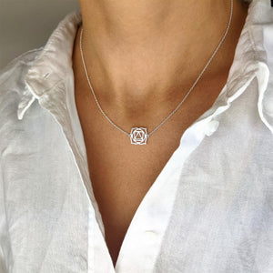 
                  
                    Sterling Silver Cut-Out Root Chakra Pendant Cable Chain Necklace
                  
                