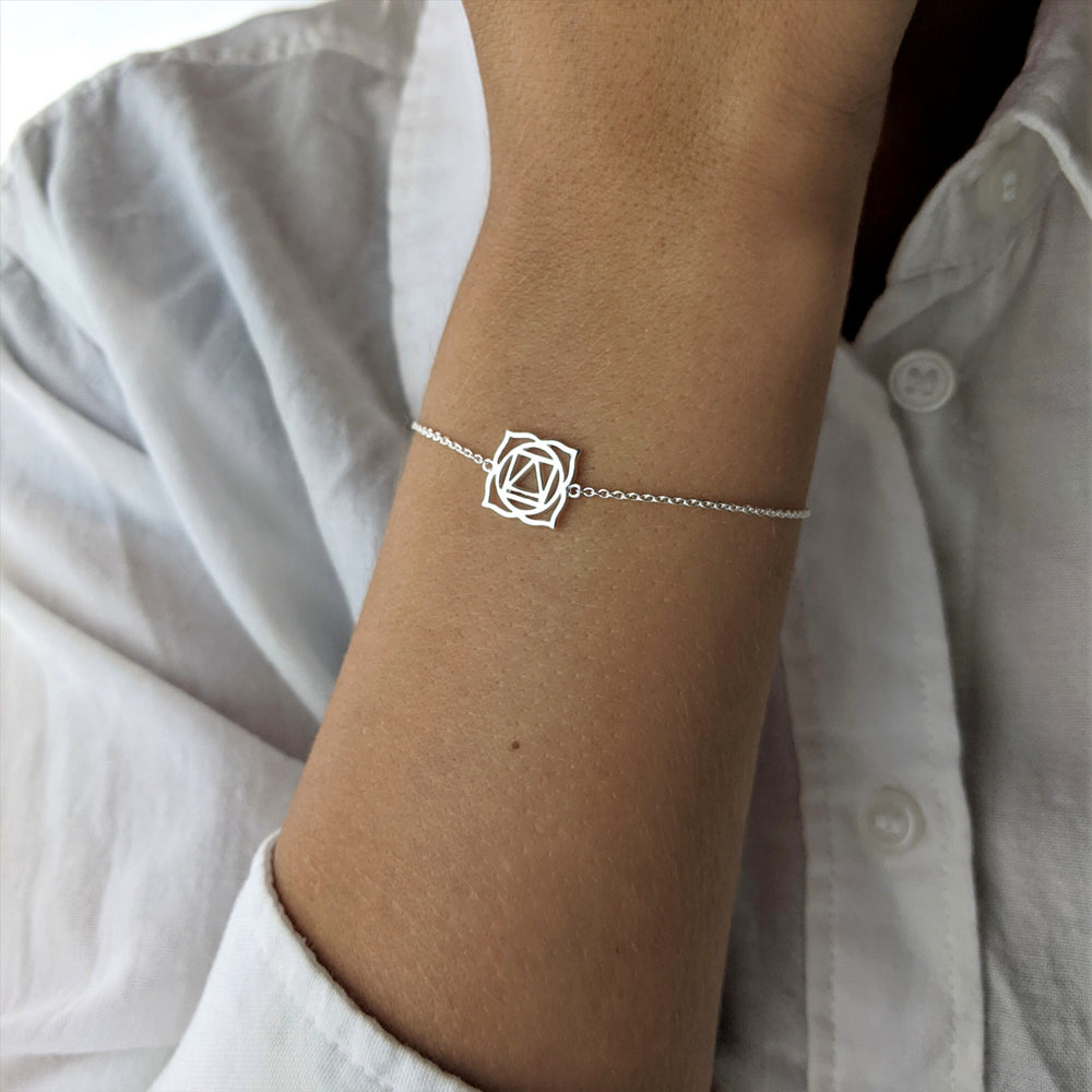 
                  
                    Sterling Silver Cut-Out Root Chakra Thin Cable Chain Bracelet
                  
                