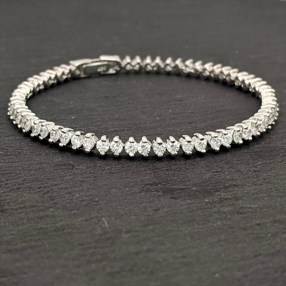 
                  
                    Sterling Silver Marquise Cubic Zirconia Tennis Bracelet Box Clasp
                  
                