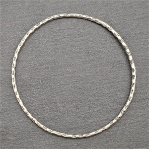 
                  
                    Hill Tribe Silver Thin Round Tube Tribal Motif Stackable Bangle
                  
                