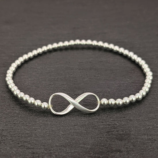 
                    
                      Sterling silver infinity ball bead bracelet — stackable design
                    
                  