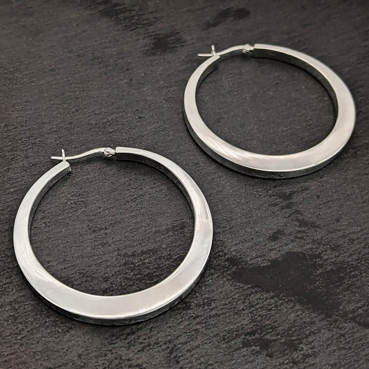 Sterling silver chunky statement hoop earrings with saddleback closure