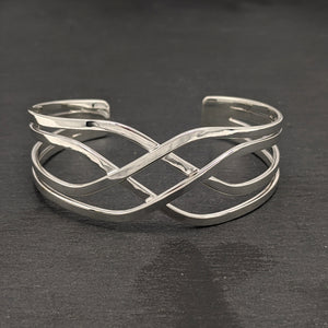 
                  
                    Sterling Silver Wide Crossover Celtic Knot Adjustable Cuff Bangle
                  
                