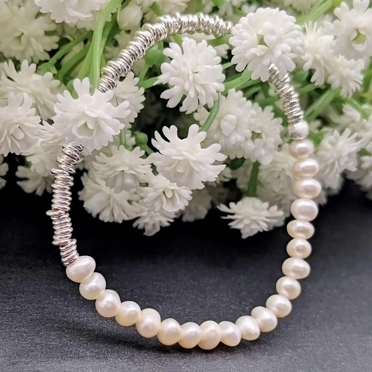 
                  
                    Sterling Silver Raw Natural Freshwater Pearl Stretch Beaded Bracelet
                  
                