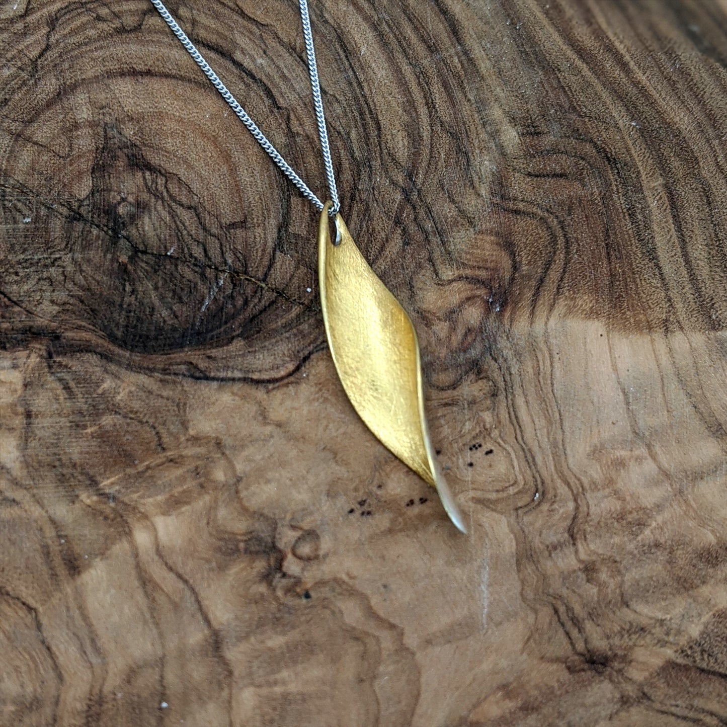 
                  
                    Brushed Gold Plated Sterling Silver Curved Leaf Pendant Necklace
                  
                