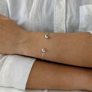 
                  
                    Sterling Silver Simple Classic Round Tube Adjustable Torque Bangle
                  
                