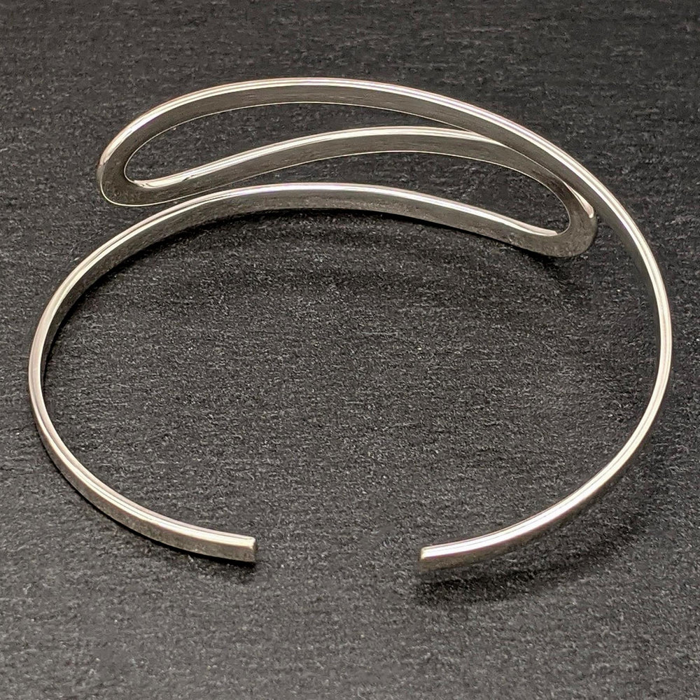 
                  
                    Sterling Silver Ribbon Twist Loop Adjustable Open Cuff Bracelet
                  
                