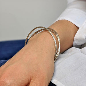 
                  
                    Karen Hill Tribe Silver Minimalist Hammered Tube Stackable Bangle
                  
                