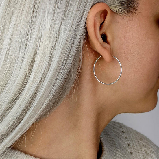 Sterling silver sleeper hoop earrings