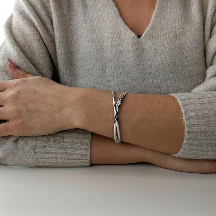 Sterling silver triple bangle — three slim, D-shaped bangles