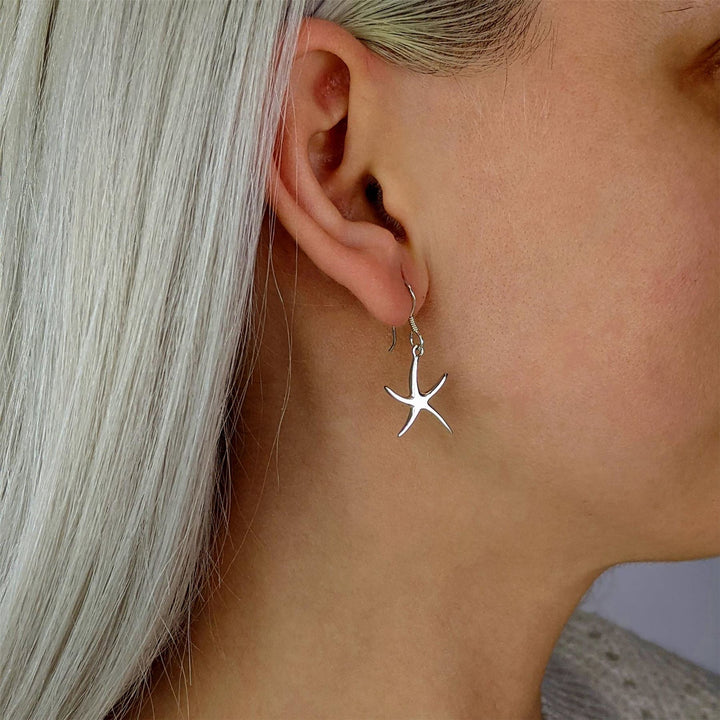 Sterling silver starfish dangle earrings
