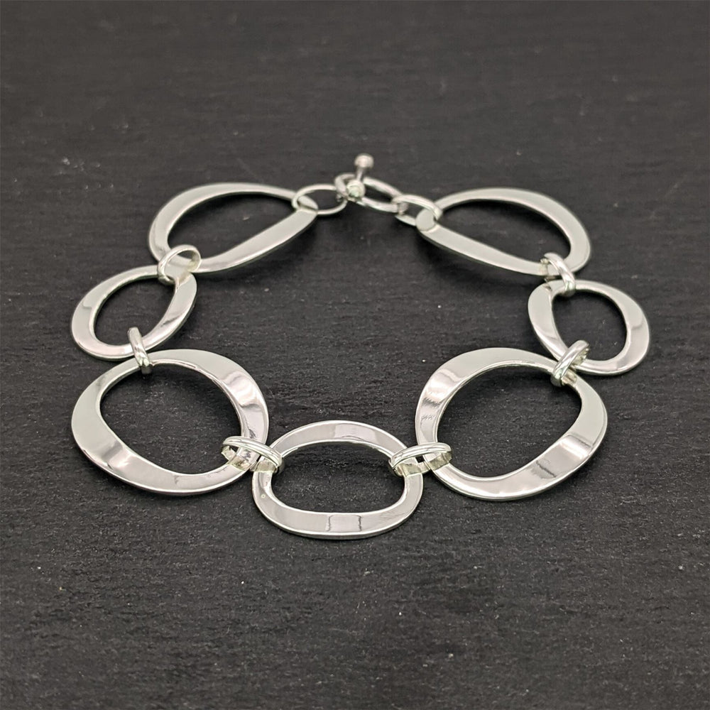 
                  
                    Sterling Silver Statement Open Circles Oval Link Bracelet Toggle Clasp
                  
                