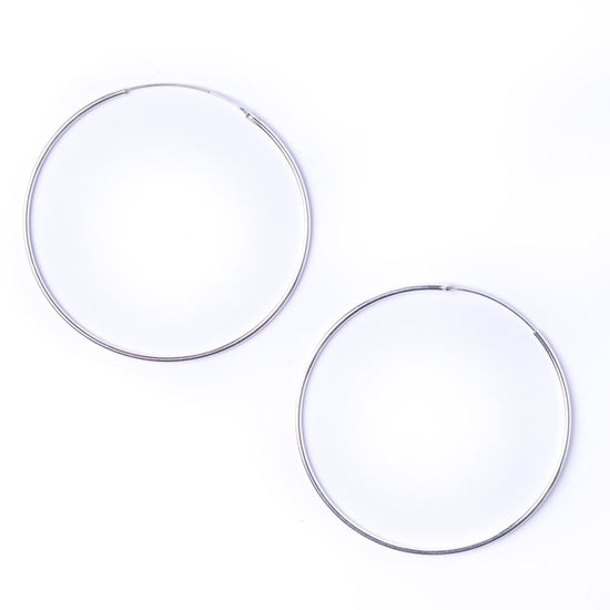 Sterling silver extra large sleeper hoop earrings — 6cm thin tube hoops